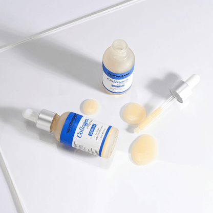 Neutriherbs Collagen + Peptides Serum 30 ml con frasco abierto, cuentagotas y textura del sérum. Primer plano que muestra la consistencia sedosa y el práctico aplicador con cuentagotas para una dosificación precisa.
